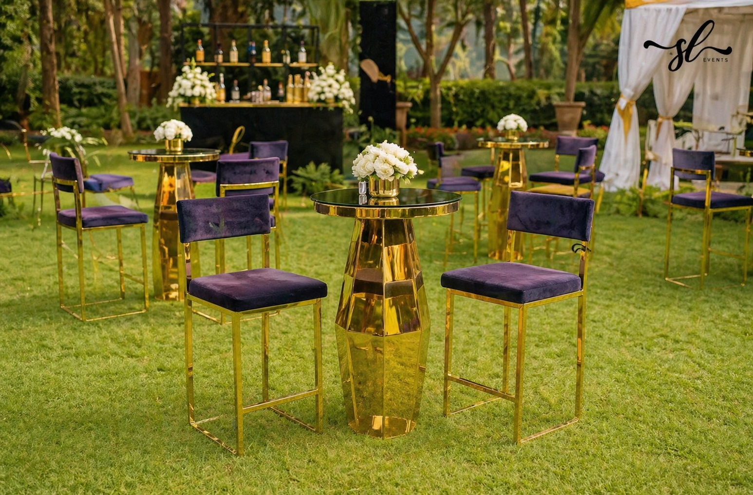 Black and gold armless bar stools at Nairobi luxury garden event