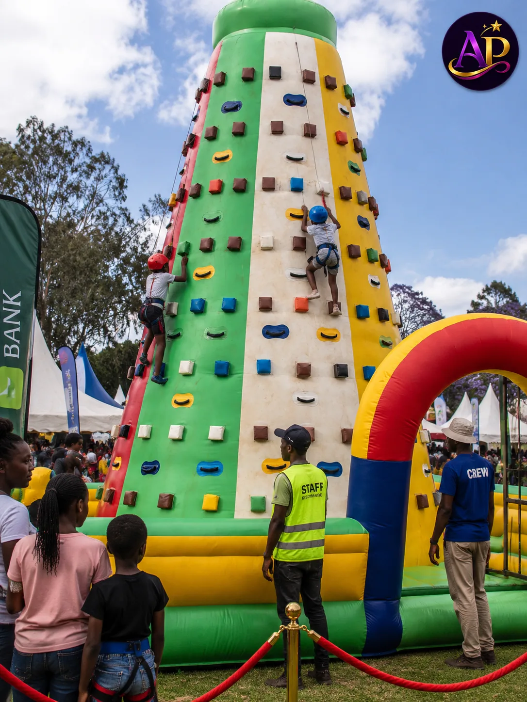 Climbing Wall Hire Nairobi at a family event with children climbing under professional supervision.