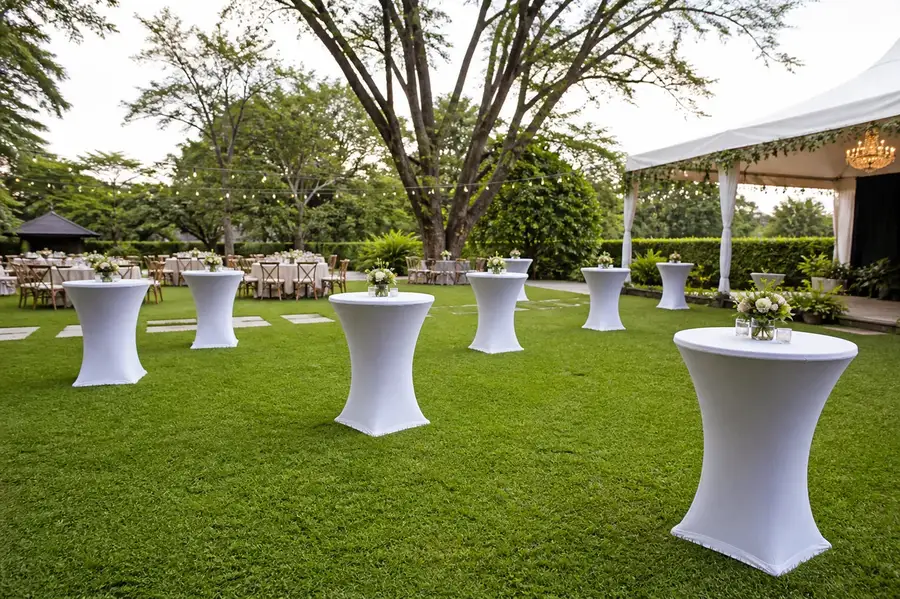cocktail poseur tables dressed with white linen for a corporate networking event in Nairobi