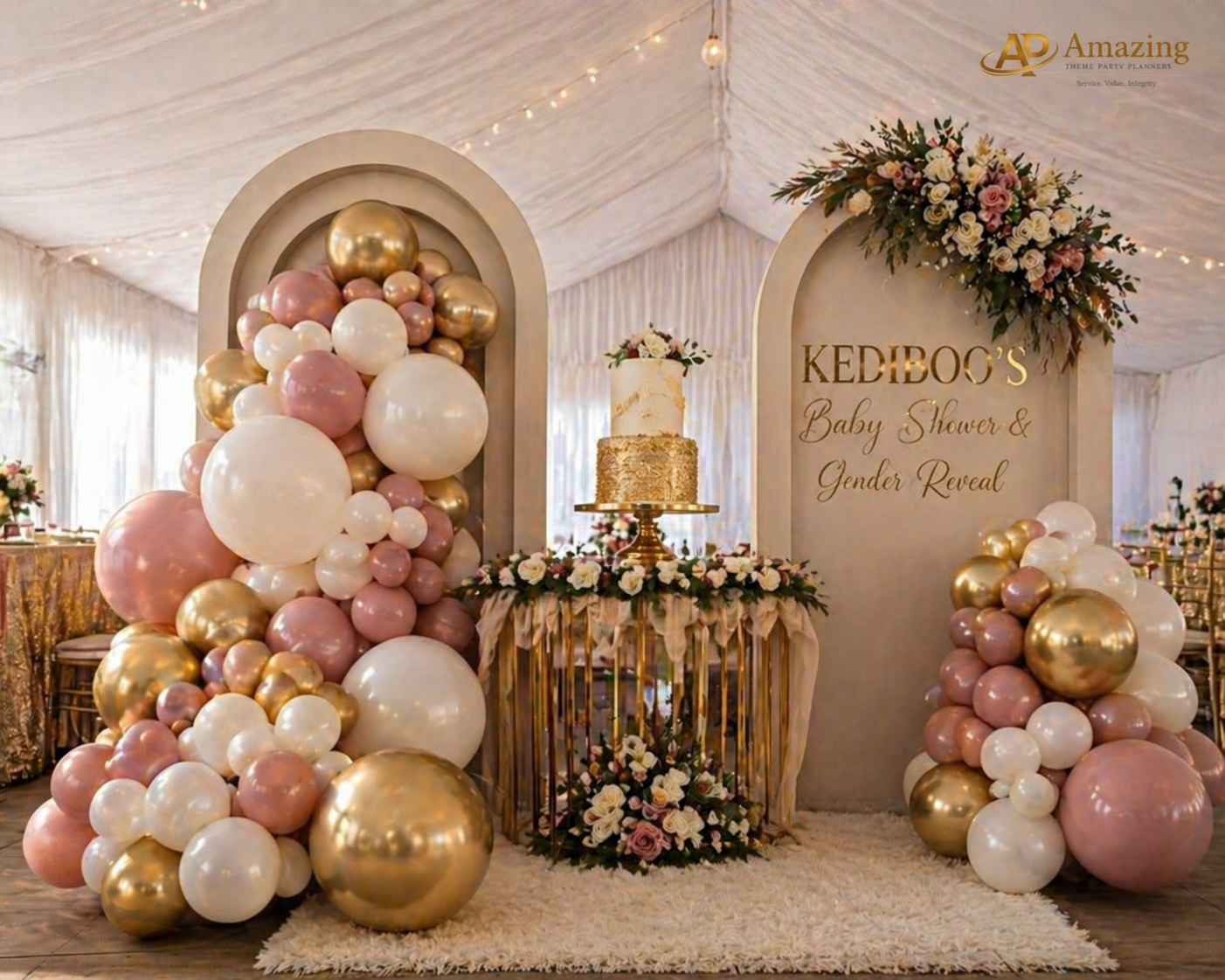 Wedding balloon duo door display with cake stand inside Nairobi marquee tent