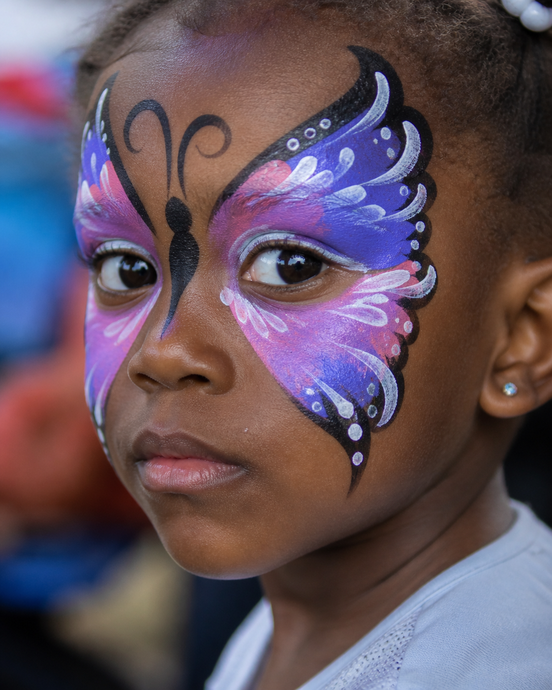 face painting hire Nairobi child getting face paint at party