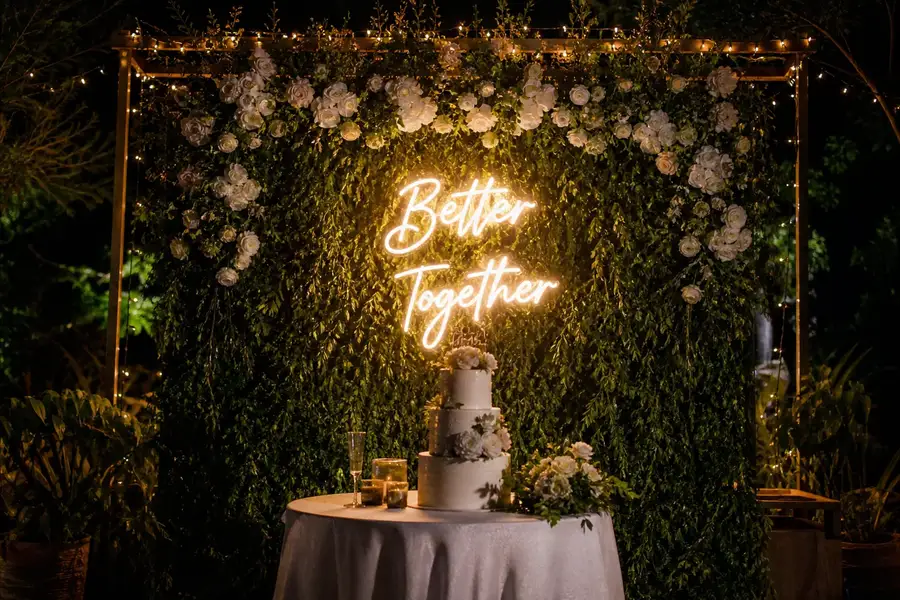 custom LED neon sign glowing at a wedding reception setup in Nairobi