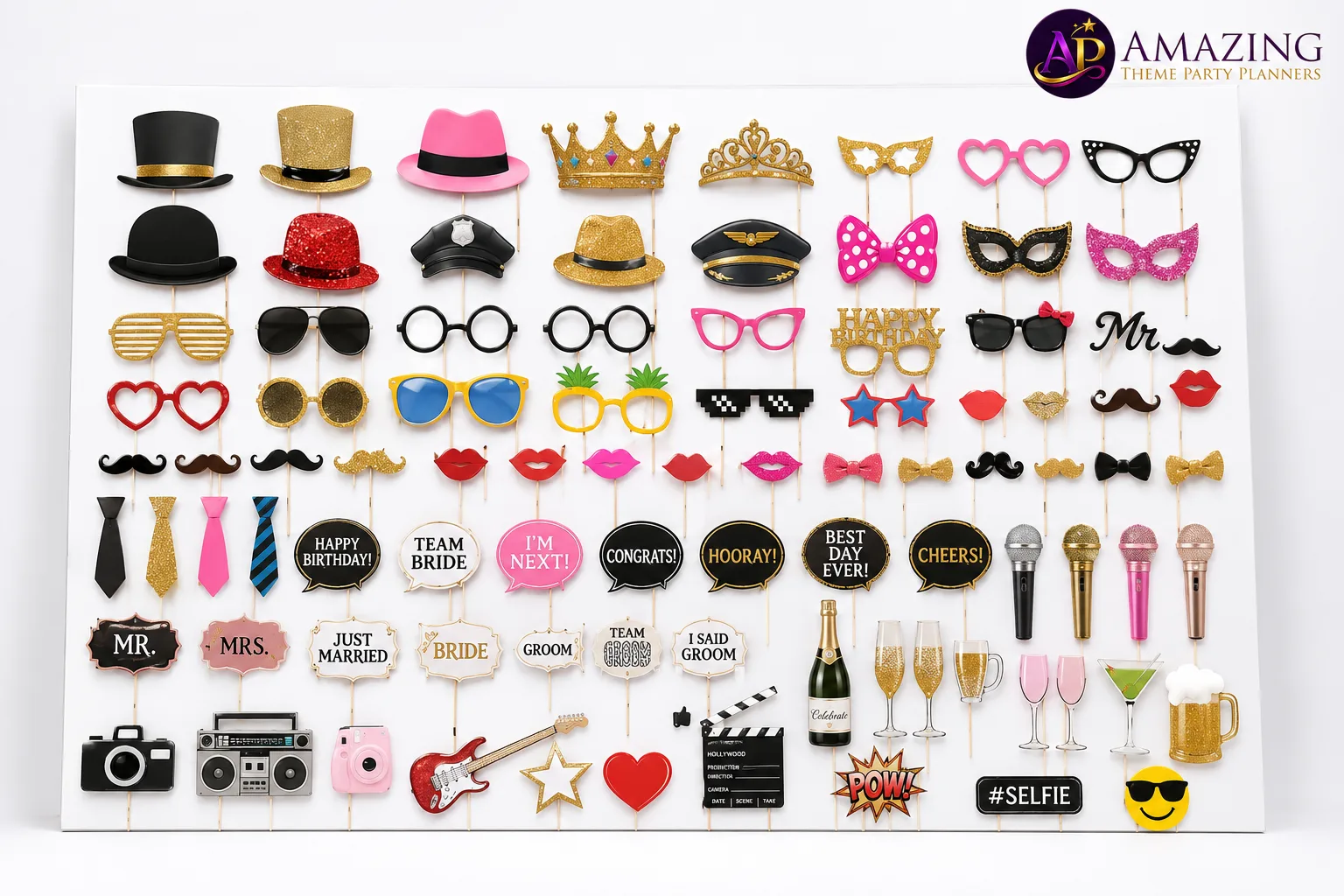 Photo Props Set Hire Nairobi display featuring glasses, crowns, hats, lips and celebration signs arranged on a board.