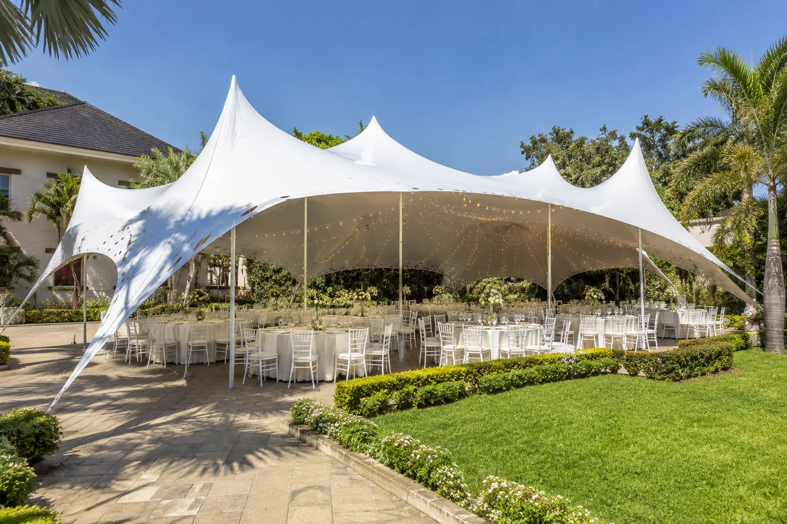 50 Seater Stretch Tent Hire Nairobi at a luxury outdoor wedding venue.