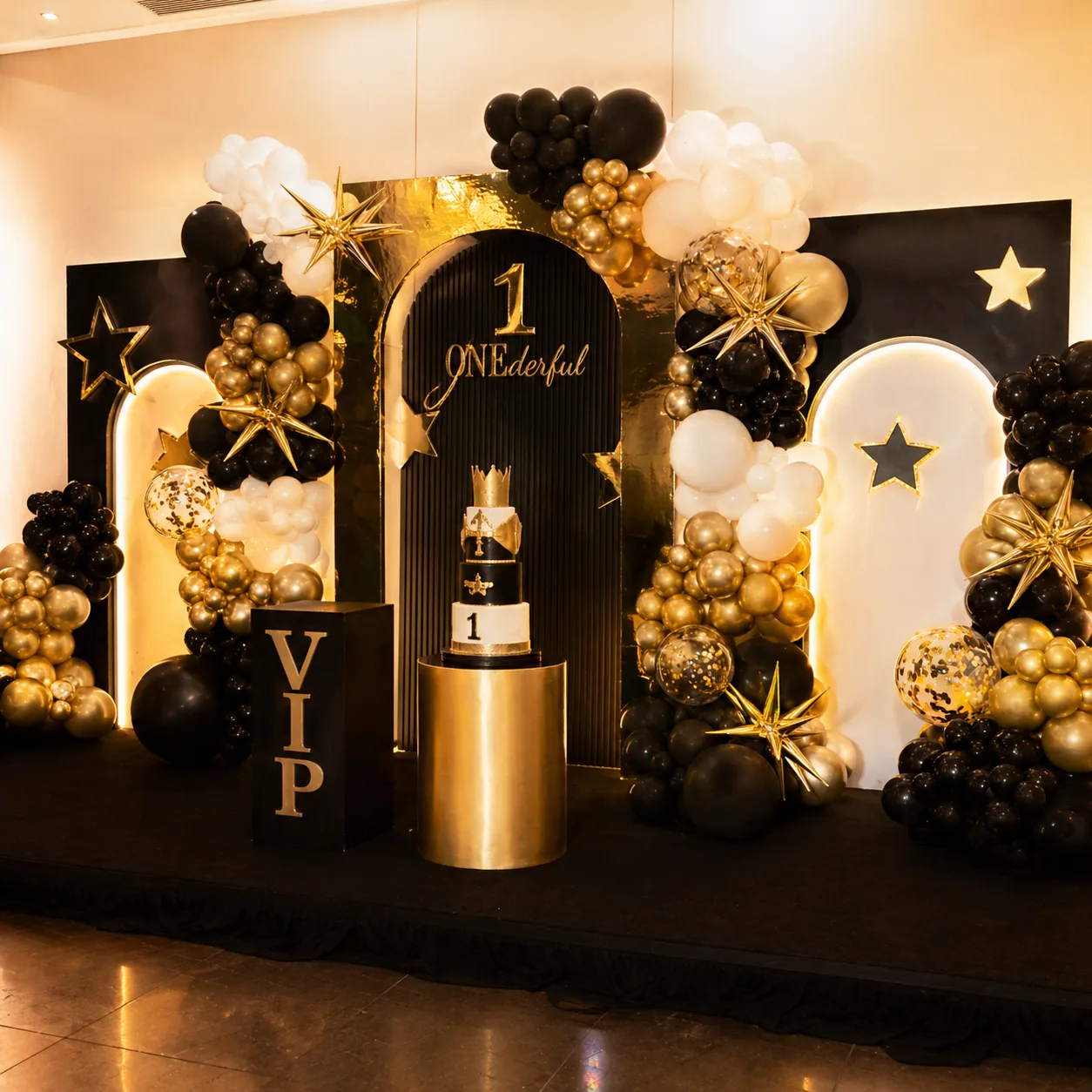 Triple door balloon backdrop with VIP stage at Nairobi birthday event